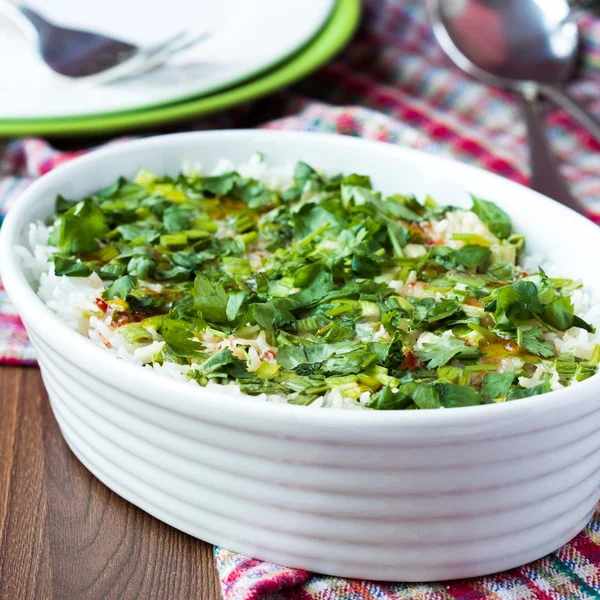 Rice casserole with egg, green spring onions, cilantro, chili, a — Stock Photo, Image
