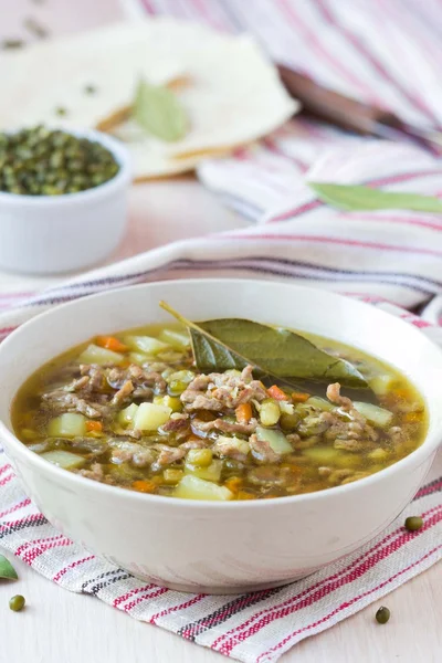 Meat soup with beef, mung green beans, legumes, hot Indian оrie — Stock Image Meat soup with beef, mung green beans, legumes, hot Indian оrie Royalty Free Stock Photos