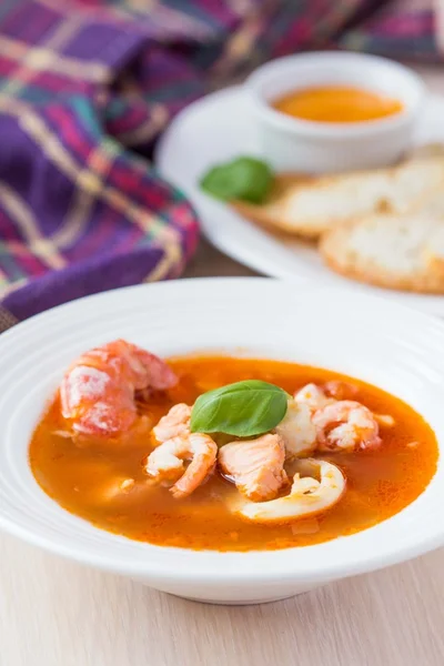 French Bouillabaisse fish soup with seafood, salmon, shrimp, ric — Stock Photo, Image