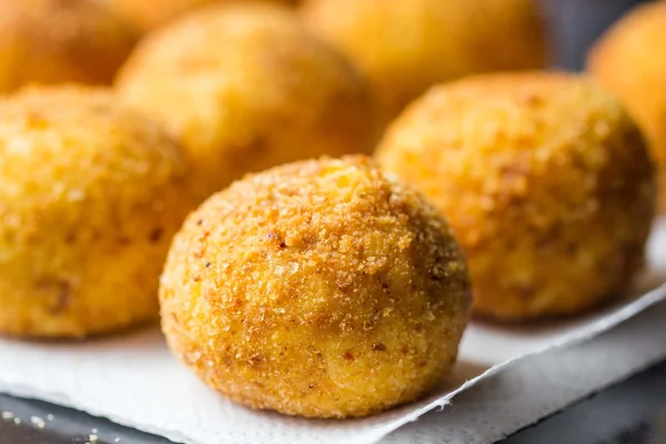 Italian appetizer arancini, rice balls stuffed with meat in oil — Stock Photo, Image