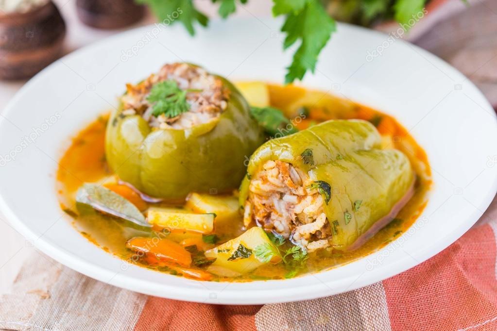 Soup with peppers stuffed meat and rice,  dolma shurpa, sorba