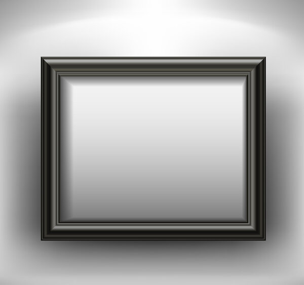 Empty black picture frame on wall