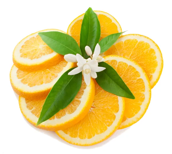 Orange with a flower and leaves — Stock Photo, Image