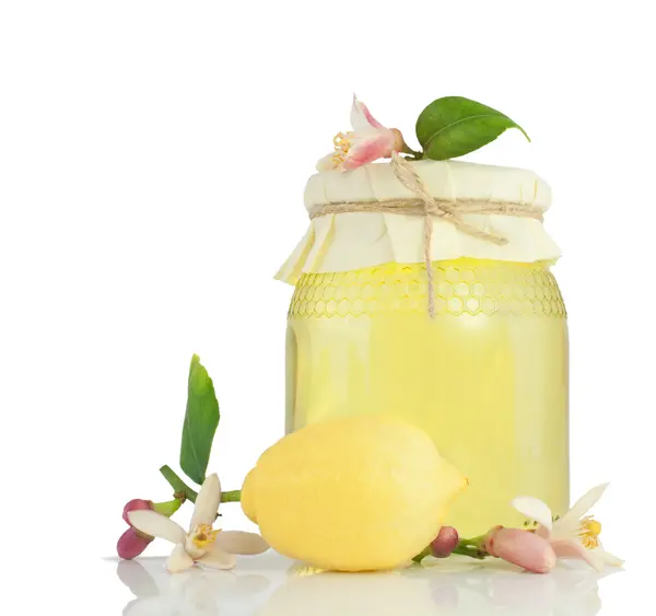 Honey, lemon and lemon flower. — Stock Photo, Image