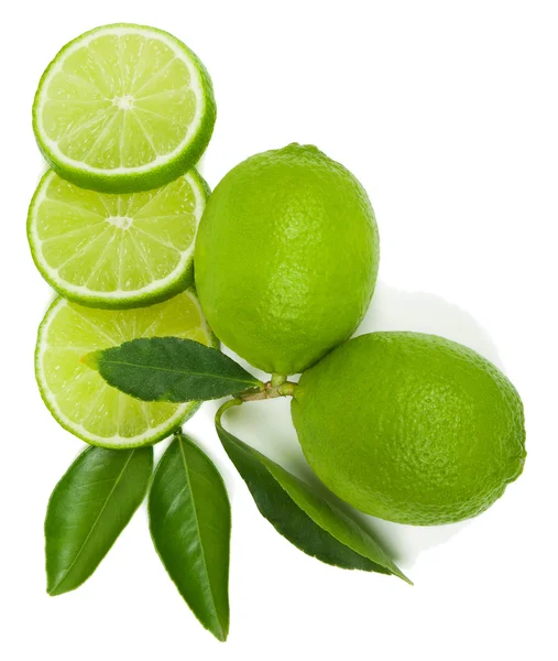 Lime whole and slices — Stock Photo, Image