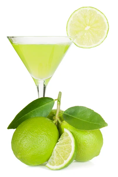 Lime juice and limes — Stock Photo, Image