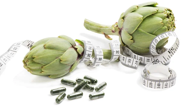 Artichokes and  dietary supplement — Stock Photo, Image