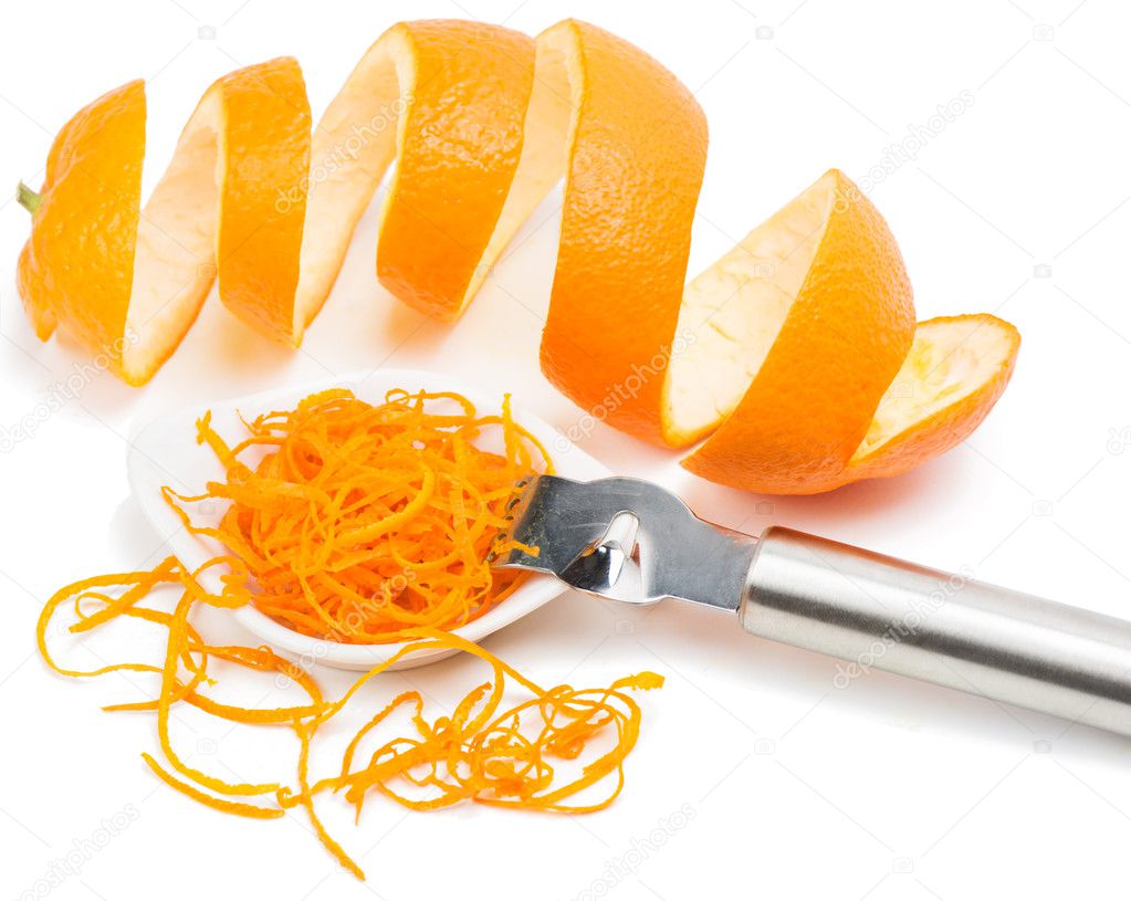   zest  of orange fruit and zester 