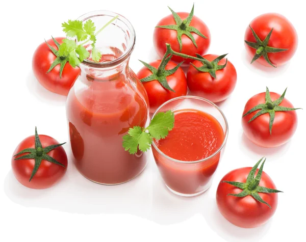 Botella y vaso de jugo de tomate con frutas —  Fotos de Stock