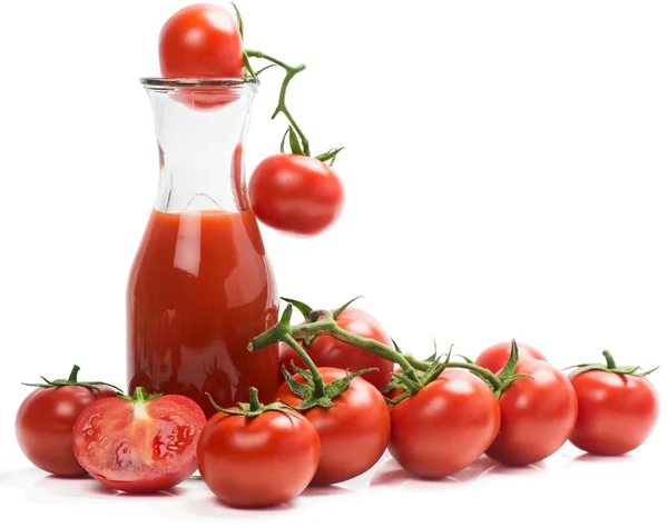 Fresh tomato juice and tomatoes — Stock Photo, Image