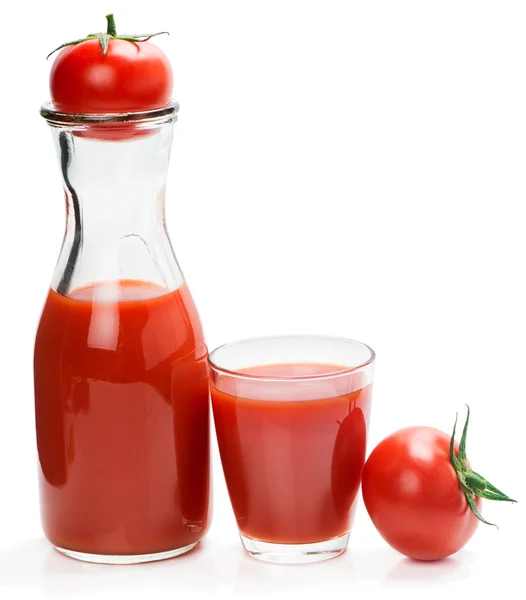 Glass of tomato juice, bottle and tomatoes — Stock Photo, Image