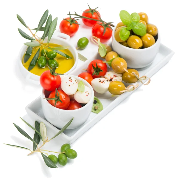 Tomatoes, mozzarella and olive oil — Stock Photo, Image