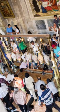 Pilgrims. Shrine. Holy Sepulcher. Jerusalem. Israel clipart