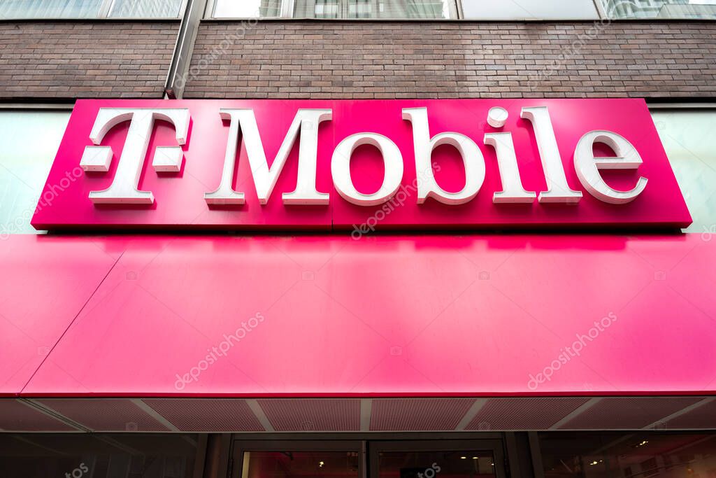 Manhattan, New York, USA - September 8, 2021: T-mobile sign above a storefront in new york City.