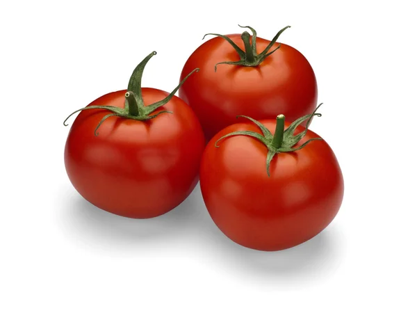 Drie rijpe tomaten. — Stockfoto