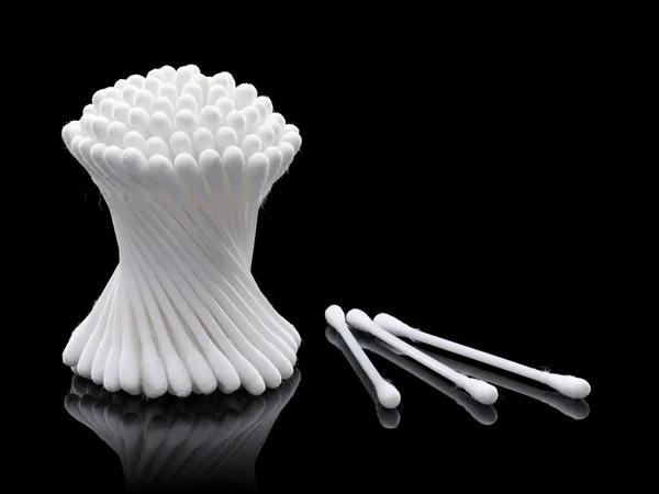 Cotton Buds on a black background — Stock Photo, Image