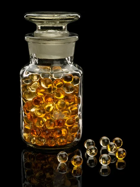 Pills with cod-liver oil — Stock Photo, Image