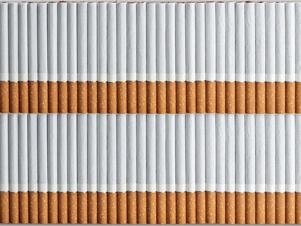Background from two numbers of cigarettes — Stock Photo, Image
