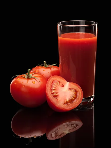 Tomatensaft und Tomaten — Stockfoto