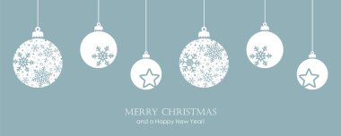 Mutlu noel kartları ve asılı top süslemeleri.