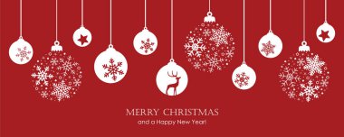Kırmızı mutlu noel kartı ve asılı top süslemesi.