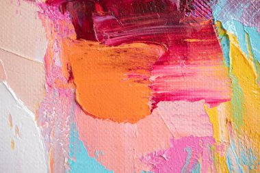 Arka plan akrilikle yazılmış. Renkli tonlarda boyamış. Yağlı boya ve palet bıçağıyla yapılmış bir resmin resmi..