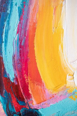 Arka plan akrilikle yazılmış. Renkli tonlarda boyamış. Yağlı boya ve palet bıçağıyla yapılmış bir resmin resmi..