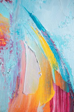 Arka plan akrilikle yazılmış. Renkli tonlarda boyamış. Yağlı boya ve palet bıçağıyla yapılmış bir resmin resmi..