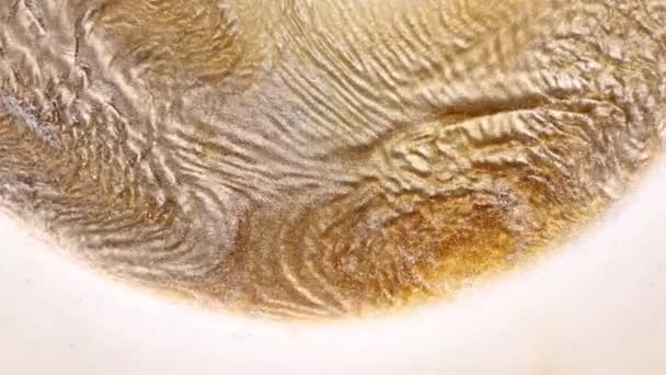 Глиняный Фон Расплавленного Золота Бронзы Меди Макро Видео Блёстки Движения — стоковое видео