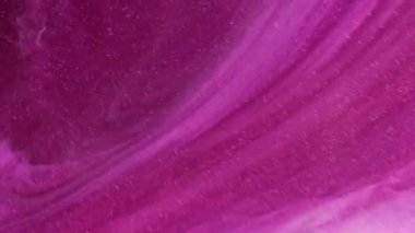 Soyut sıvı sanat arka planı. Canlı pembe boya akışları ve taşkınlıkları. Parlak sıvı dökülür. Zengin fuşya boyası dökülüyor. Hareket grafikleri için uygun yüksek kaliteli video tasarımı, görsel