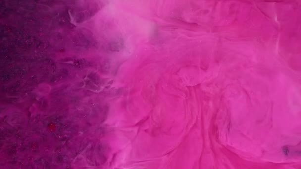 Абстрактний Фон Фентезійного Рідинного Мистецтва Скручується Рожева Фарба Фіолетовому Фоні — стокове відео
