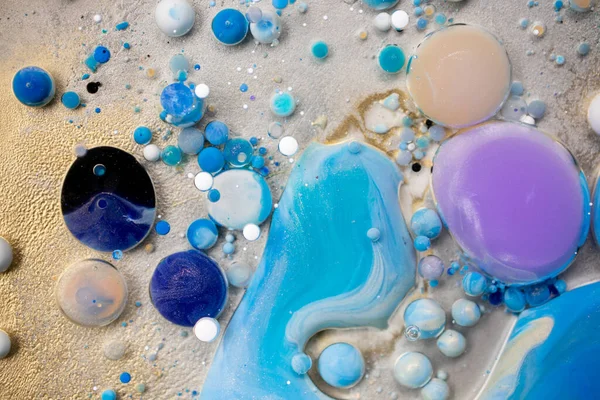 Acrylic Paint. Space Universe, Quantum Physics. Fantastic Hypnotic Surface. Colorful Bright Bubbles Oil Beautiful Paint Universe Color Moving Multicolored. High quality photo.