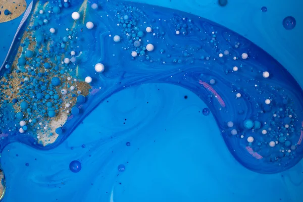 Acrylic Paint. Space Universe, Quantum Physics. Fantastic Hypnotic Surface. Colorful Bright Bubbles Oil Beautiful Paint Universe Color Moving Multicolored. High quality photo.