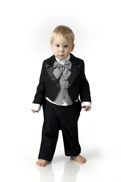 Boy in a frock coat — Stock Photo, Image