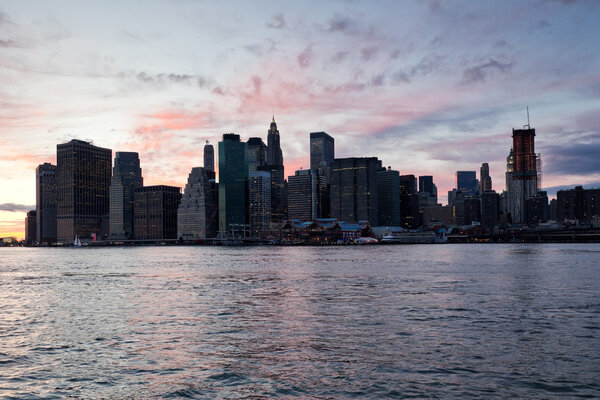 Skyline of Manhattan after sunset, View from Brooklyn side, New York, USA