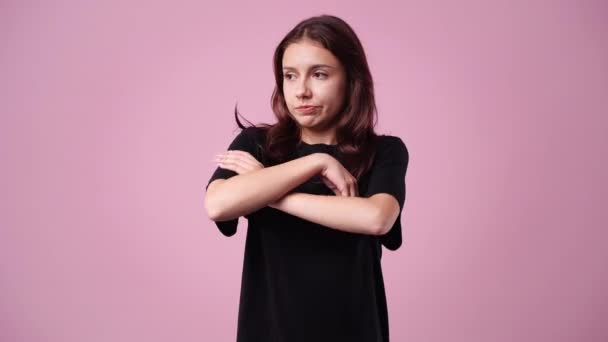 Video Thoughtful Woman Who Folded Her Hands Pink Background — Stock Video