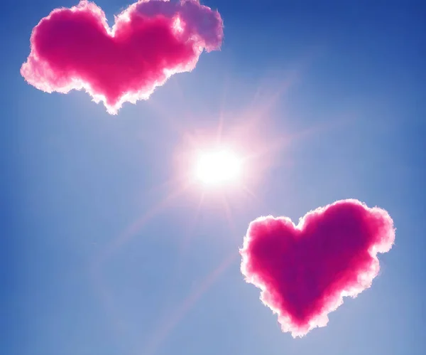 Pink heart shaped cloud in the blue sky. High quality 3d illustration
