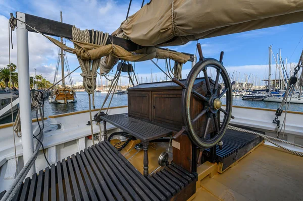 On the board of Santa Eulalia ship in Barcelona, Spain. Sailboat and marina Rambla de Mar in Port Vell. Sailing boats