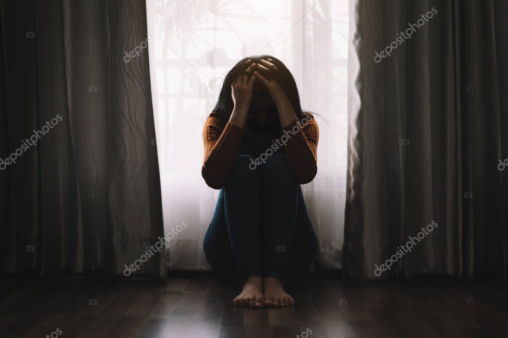  woman sit Depression Standing by window and anxiety Copy space. 