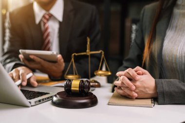 Lawyer at desk working on meeting with client