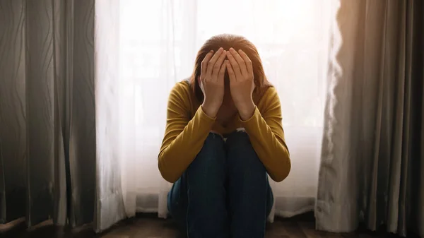 Crying Woman Depression Covering Face Hands While Sitting Floor Home — Photo