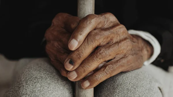 Close up of male wrinkled hands