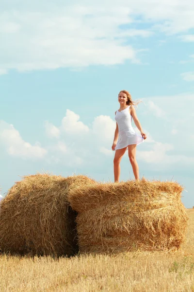 Dancing on straw bales — Stock Photo, Image