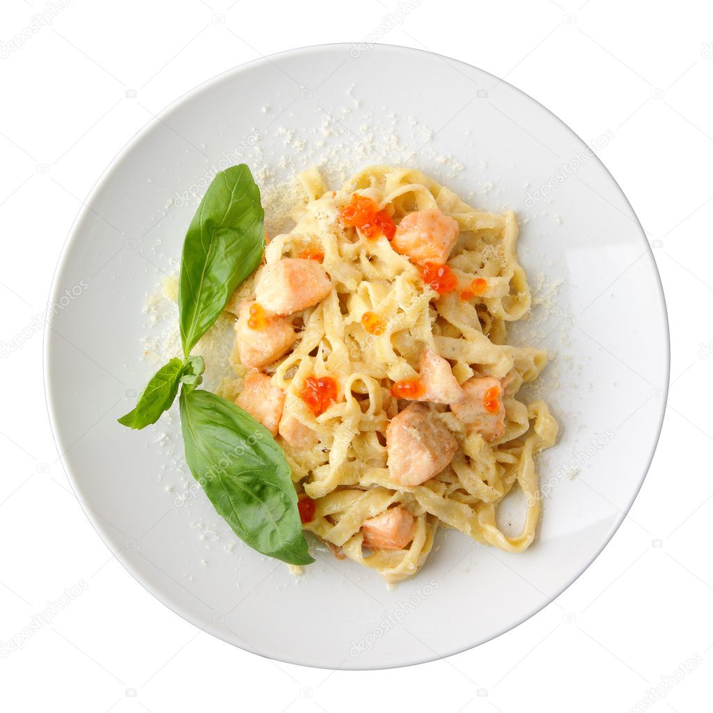 Top view of fettuccine with salmon and caviar