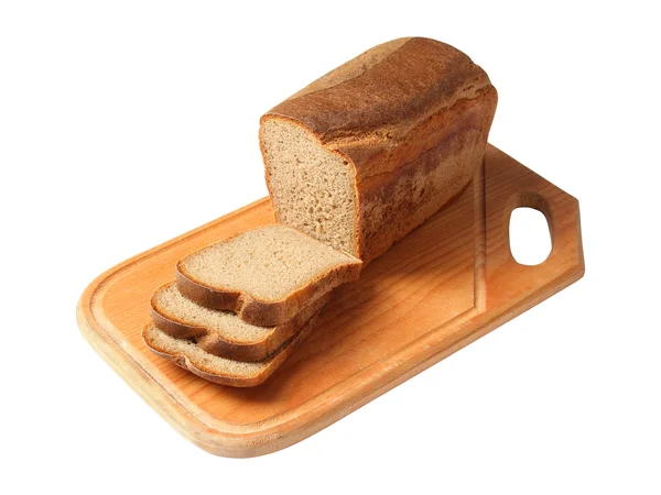 Bruin brood op een snijplank — Stockfoto