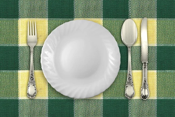 boş tabak, çatal, kaşık ve bıçak ile masa üstü görünümü
