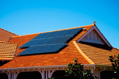Residential Solar Panels on a House clipart
