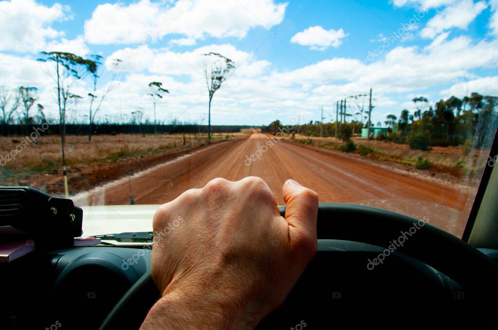 Driver in Off Road Outback Track