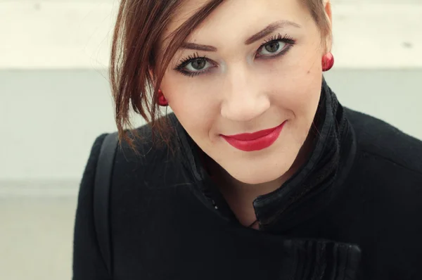 Beautiful brunette with red lipstick — Stock Photo, Image