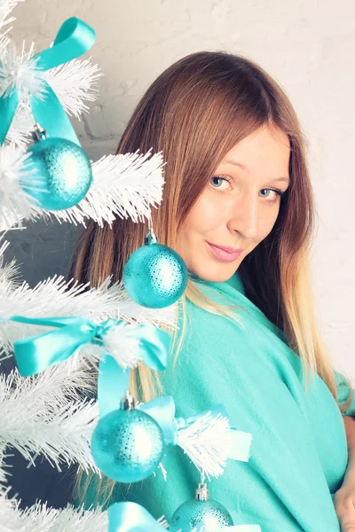 Girl with long hair at Christmas — Stock Photo, Image